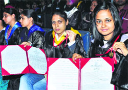 Students of Punjabi University, Patiala, with their degrees on Thursday. Tribune photo: Rajesh Sachar