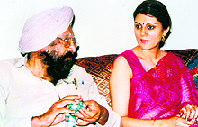 With Sharda Kaushik who co-authored a book with him