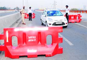 Newly placed barricades on the elevated stretch of the Amritsar-Jalandhar GT Road in Amritsar