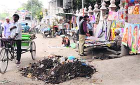 A pile of garbage dumped in the middle of the road chosen for the heritage walk in Amritsar