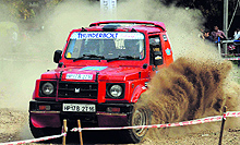 A participant exhibits motoring skills during the 27th Rally Spectator Special on the Exhibition Ground at Sector 34 in Chandigarh on Friday