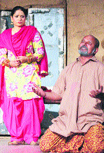 Actors of the Theater forTheatre Group Chandigarh present the play Balde Tibbe in Jalandhar on Thursday.