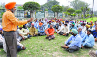 Protesters outside the Deputy Commissioners office in Ludhiana on Friday. Photo: Inderjeet Verma