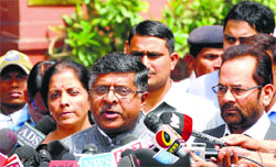 BJP leader Ravi Shankar Prasad addresses mediapersons in New Delhi on Friday. A Tribune photo