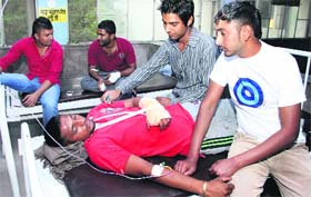 Injured Amandeep at the Civil Hospital after a clash at the Court Complex in Jalandhar on Saturday