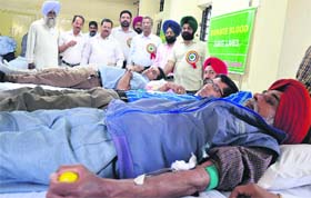 Members of the BSNL Employees Union donate blood in the Telephone Exchange building, Bharat Nagar Chowk, Ludhiana, on Saturday