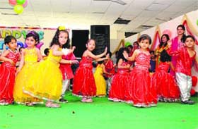 Little flowers: Tiny tots of Daddy's Teddy Playway School perform a dance item during the annual day function in Bathinda on Sunday