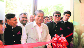 Chief Minister Harish Rawat inaugurates hotel Four Points in Dehradun on Sunday.