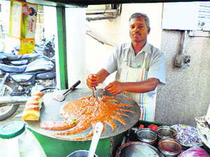 Kusheshwar Bhagat at his paav bhaji rehri in Sector 15, Gurgaon. 