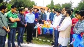Members of the National Students Union of India pay homage to Bhagat Singh, Rajguru and Sukhdev at the University of Jammu on Sunday