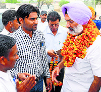 SAD candidate Deepinder Dhillon campaigns in a village near Rajpura on Sunday