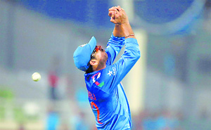 Yuvraj Singh (below) drops a sitter yet again. 