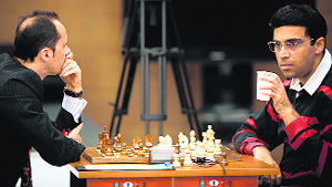 Viswanathan Anand (right) beat former challenger Veselin Topalov of Bulgaria in the ninth round of Candidates Chess tournament on Sunday. photo courtesy: 