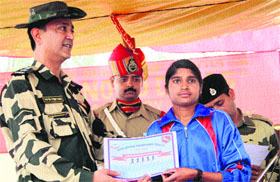 BSF officials facilitate the winners during a sports event organised at Government Senior Secondary School, Bhindi Saida, Amritsar, as part of its de-addiction campaign.