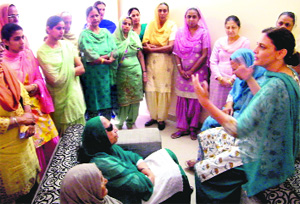 Veenu Badal, Manpreet Badals wife, holds a nukkad meeting with women residents of Ward No. 6 in Bathinda on Monday.