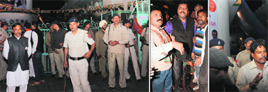 (From left) A heavy police force deployed outside the BJP office in Sector 33, Chandigarh, on Monday; BJP leader Anil Dubey (centre), who was stabbed; and party leader Mukesh Rai in police custody.