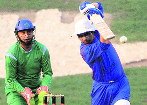A match in progress during the CII-ATS Corporate Sports League Cricket Cup at the Cricket Stadium in Sector 16, Chandigarh.