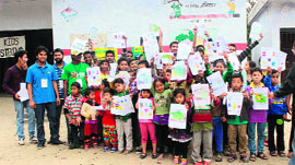 Children participate in an awareness camp on garbage dispoal organised by the Waste Warriors in Dehradun on Sunday.