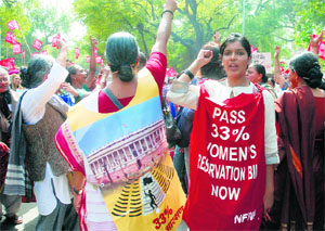AIDWA activists demonstrate near Parliament, demanding the passing of the Womens Reservation Bill. tribune photo: manas ranjan bhui