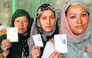 Women await their turn to cast their vote during the Ladakh Autonomous Hill Development Council elections in Kargil district last year.