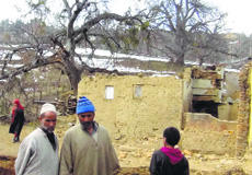 A damaged house in Budgam district.