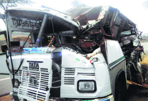 Mangled remains of a bus that rammed into a trailer on the Hanumangarh highway on Monday.