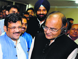 State BJP chief Kamal Sharma with Arun Jaitley at the opening of a media centre in Amritsar on Monday.