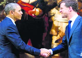Dutch Prime Minister Mark Rutte and US President Barack Obama after speaking to the press in Amsterdam on Monday