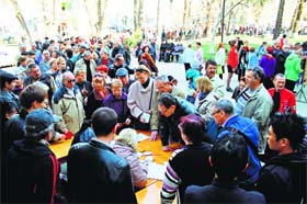 People queue up to get their Russian passports in the Crimean capital of Simferopol on Sunday