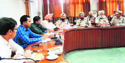 Deputy Commissioner Kamal Kishore Yadav during a meeting with other officials in Bathinda on Tuesday. a tribune photograph