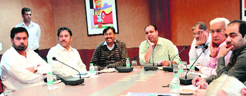 Deputy Commissioner Mohammad Shayin (centre) during a meeting with representatives of political parties in Chandigarh on Tuesday.