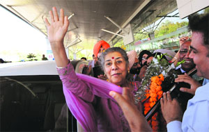 Senior Congress leader Ambika Soni being welcomed at the airport in Chandigarh on Tuesday. 