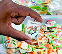 Congress president Sonia Gandhi's campaign material outside the AICC headquarters on the eve of party's function to release manifesto for the Lok Sabha polls in New Delhi on Tuesday