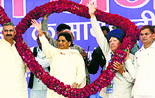 BSP president Mayawati waves at a crowd in Hisar on Tuesday