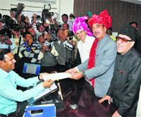 Congress leader Ghulam Nabi Azad files nomination papers for the Udhampur-Doda parliamentary seat in Kathua on Tuesday. He is accompanied by Chief Minister Omar Abdullah and JKPCC chief Saifuddin Soz.
