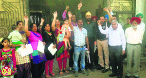 Parents of children studying at Roop Vatika School protest against the school management in Jagraon on Tuesday.