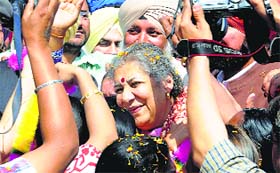 Warm welcome: Congress candidate from Anandpur Sahib Ambika Soni is greeted by party supporters in Mohali on Tuesday