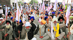 Farmers hold a dharna
