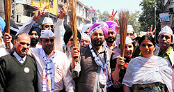 AAP candidate from Amritsar Dr Daljit Singh (in pink turban) begins his poll campaign in Amritsar on Wednesday