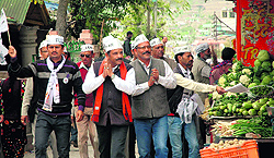 Harish Chandra Arya, AAP candidate from the Almora Lok Sabha seat, holds a roadshow in Pithoragarh on Wednesday