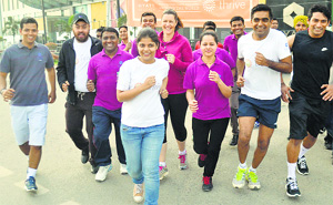 Employees of Hyatt Regency run to promote fitness in Ludhiana on Wednesday.