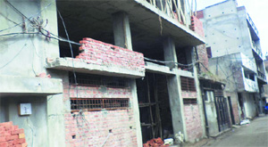Illegal buildings under construction in Zone A of the Municipal Corporation, in Ludhiana.