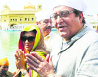 Vinod Khanna with his wife Kavita Khanna at the Golden Temple in Amritsar on Wednesday. Photo: Vishal Kumar