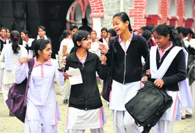 Girls come out of the examination hall on the first day of the state board examination of class X at MKP Inter College in Dehradun on Thursday.