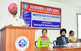 Dr Ramandeep Singh, associate professor, Department of Management, PAU, addresses a conference on management in Ludhiana on Thursday