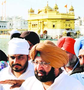 High hope: PPCC candidate Capt Amarinder Singh pays obeisance at the Golden Temple in Amritsar on Friday