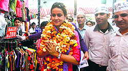 AAP candidate Gul Panag during her election campaign in Sector 22 on Friday