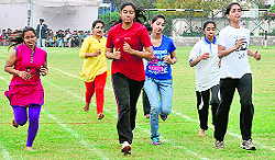 Students take part in a race during the annual sports meet at Banur on Friday