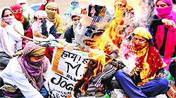 Inmates of Working Women Hostel, Sector 24, protest in Chandigarh on Friday