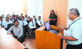 Prof Vijay Thawani delivers a lecture in Dehradun on Friday.